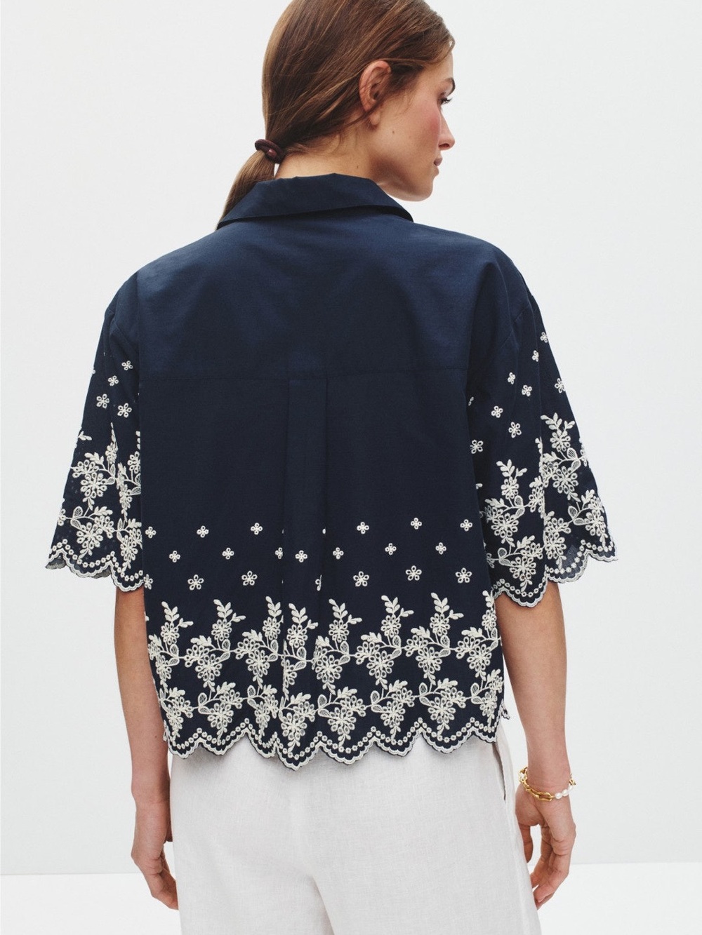 CeCe Navy Top with White Eyelet Embroidery - Picture 2 of 6